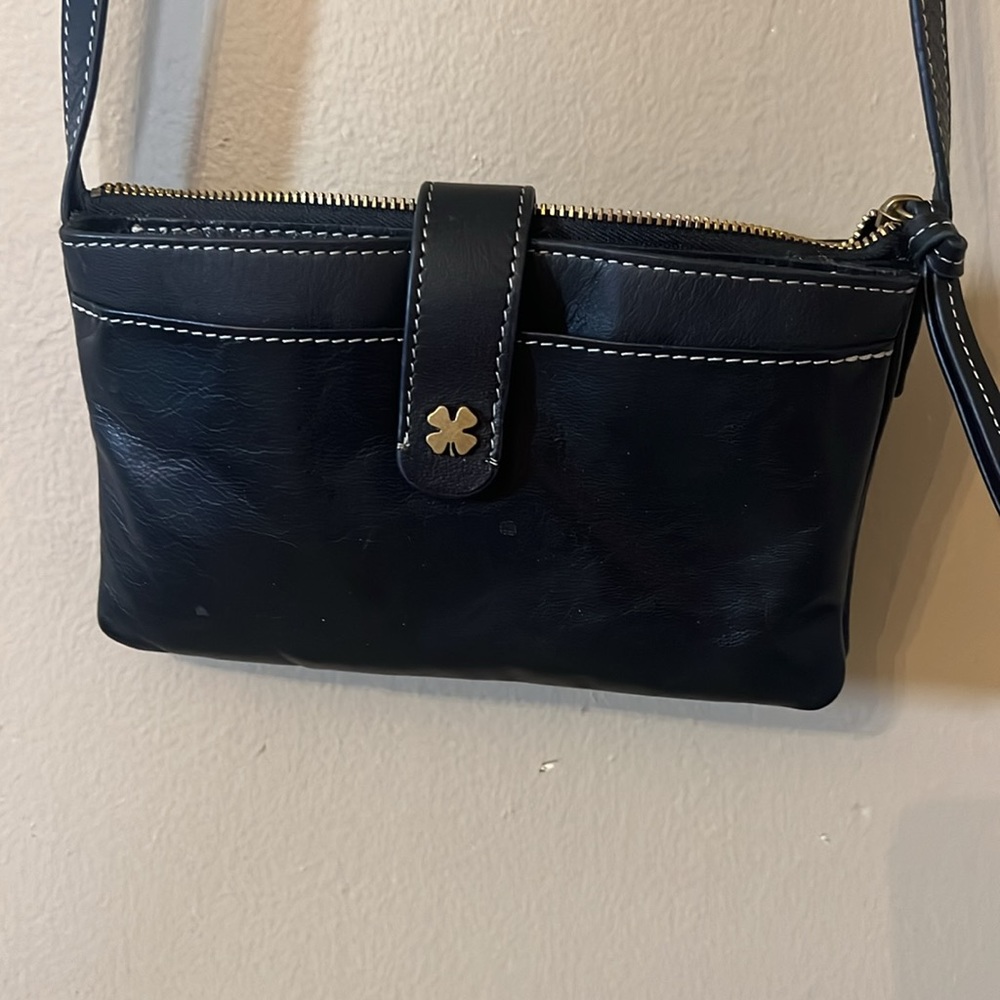 Lucky brand black leather Crossbody. Small purse. Excellent condition.